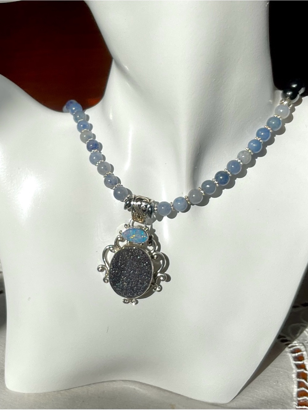 Handmade, necklace featuring a dark druzy and opal sterling silver pendant.